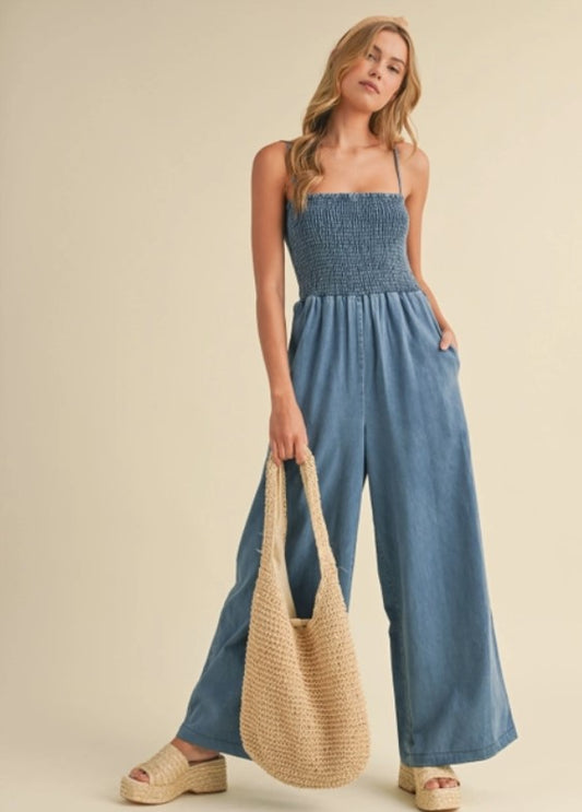 Smocked denim jumpsuit